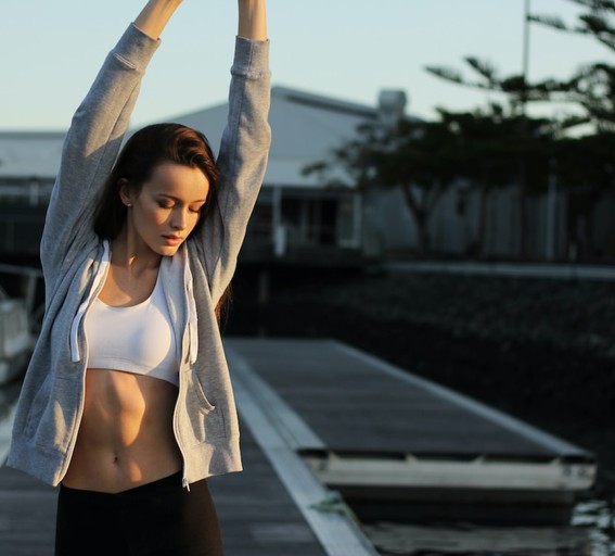 woman with hands up in the air